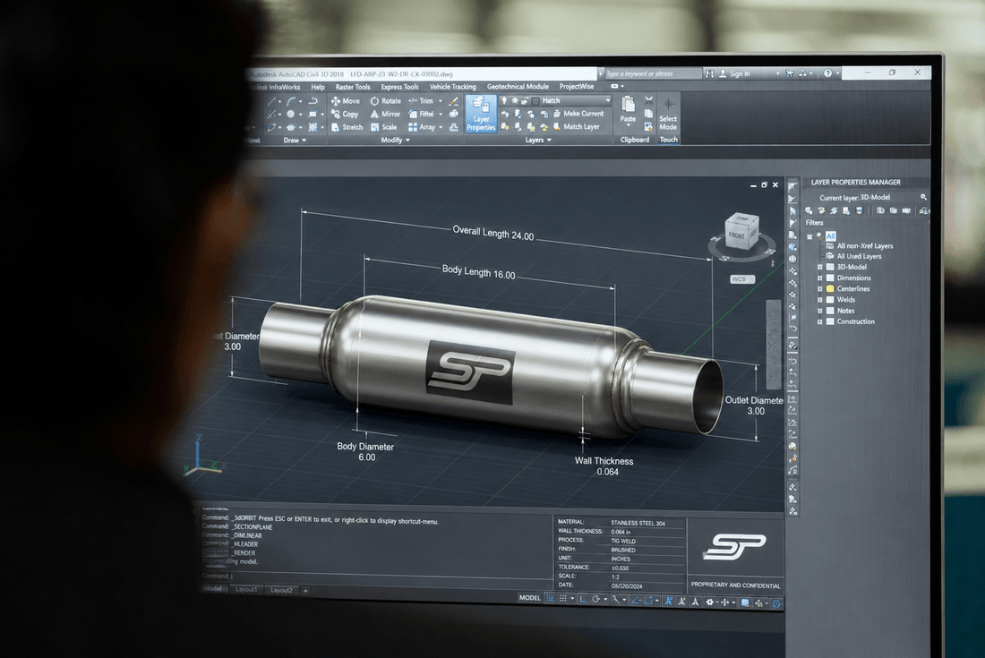 3D CAD model of a cylindrical metal part on a computer screen, showing detailed dimensions, specs, and material notes.