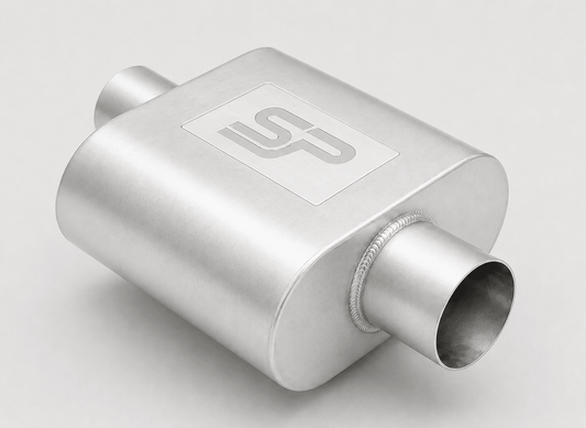 A silver metallic exhaust muffler with a brushed finish, featuring a square-shaped body, cylindrical inlet and outlet pipes, and a white square logo plate on top.